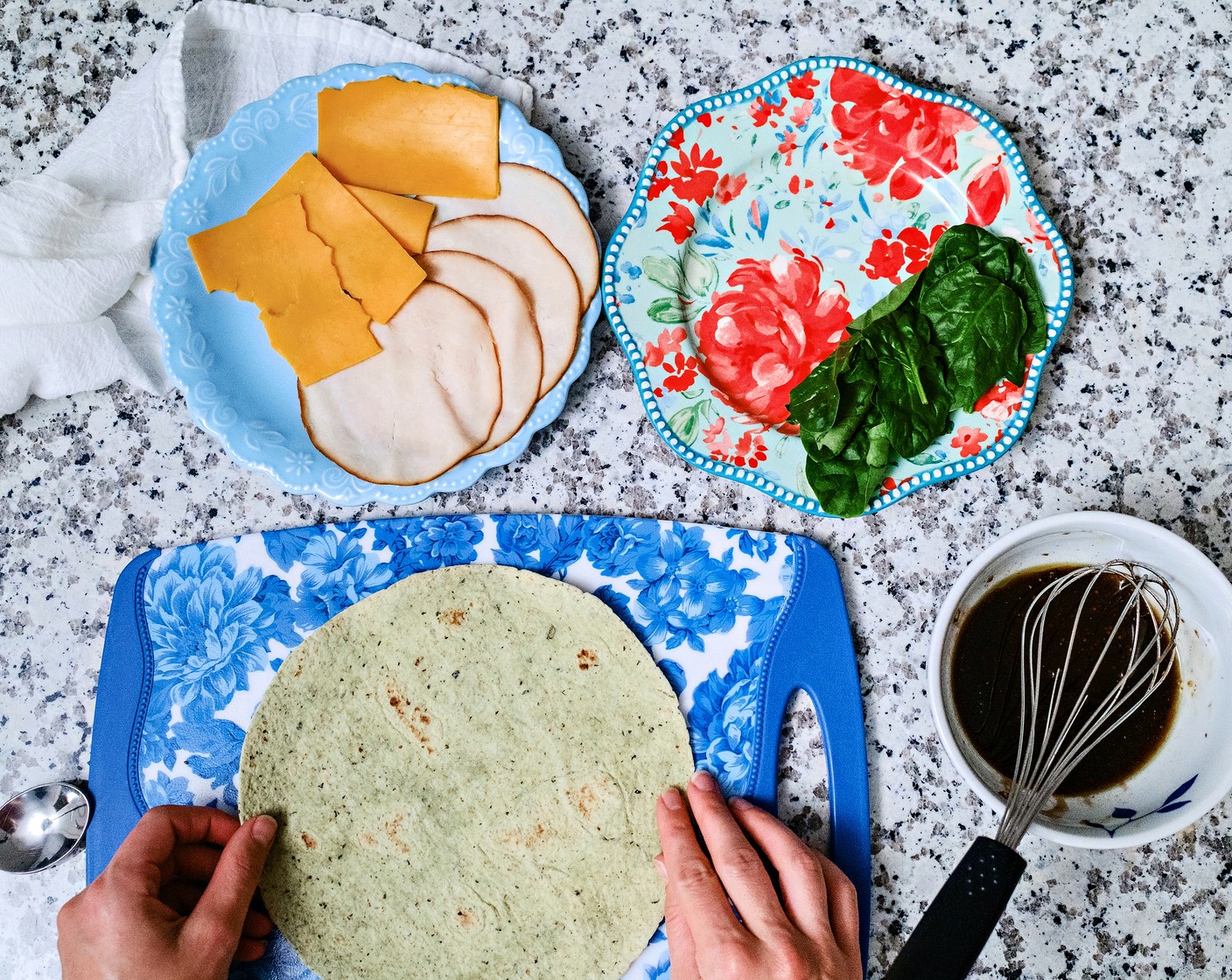 step 2 On a plate or clean surface, lay out one Spinach Tortilla Wraps (2).