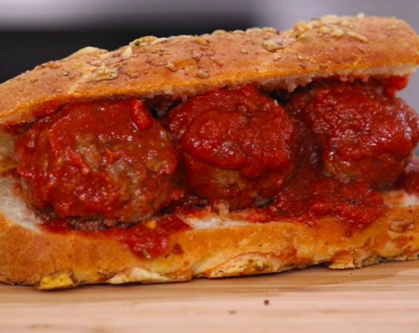 step 17 To assemble, cut the bread in half and place warm 3-4 meatballs on each 6-inch sub. Top with extra sauce. Serve immediately!