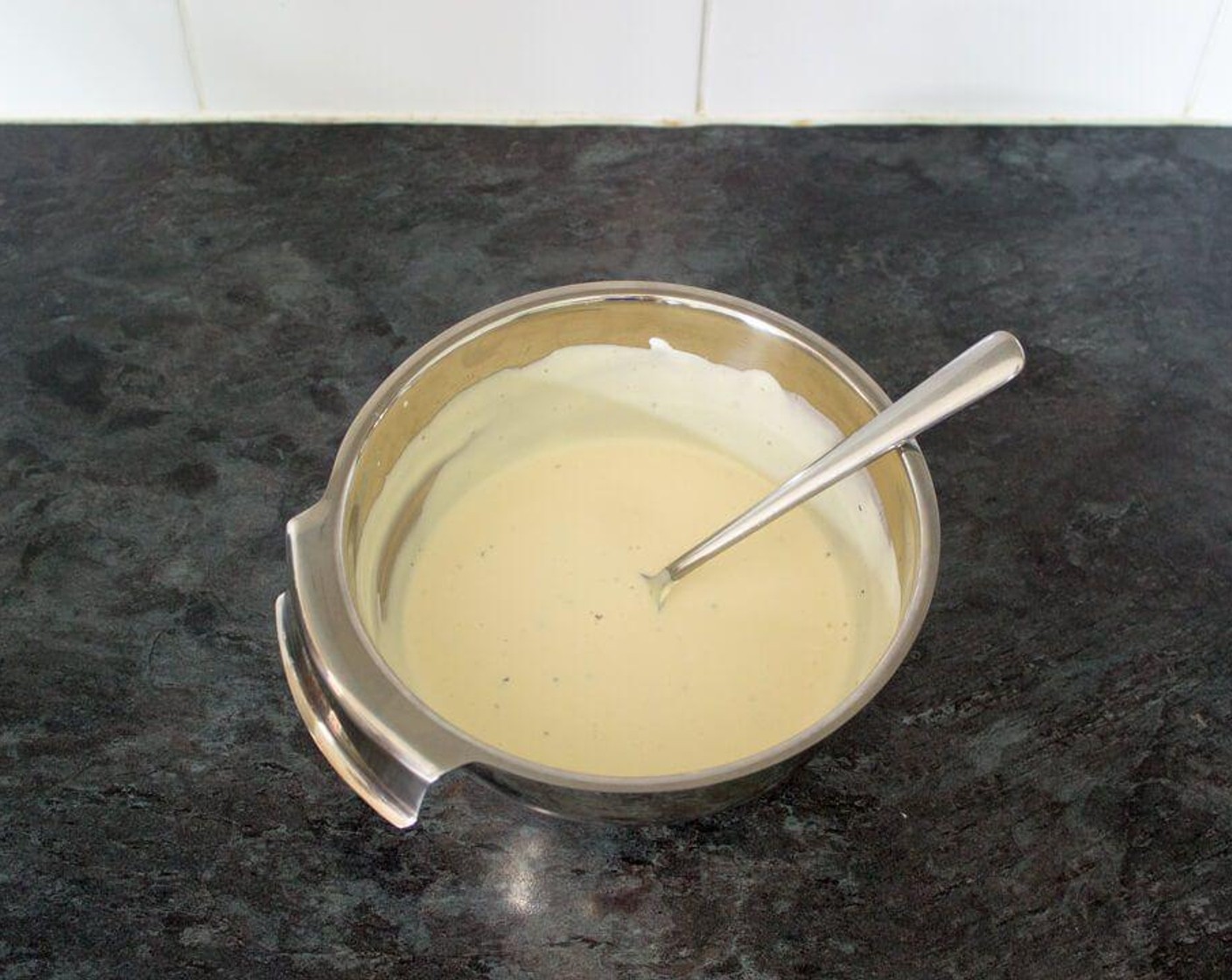 step 4 In a little bowl, mix together the Hellmann's® Real Mayonnaise (1/3 cup), Sour Cream (1/2 cup), Red Wine Vinegar (2 Tbsp), Honey Mustard (2 Tbsp) and season with Salt (to taste) and Simply Organic® Black Pepper (to taste).