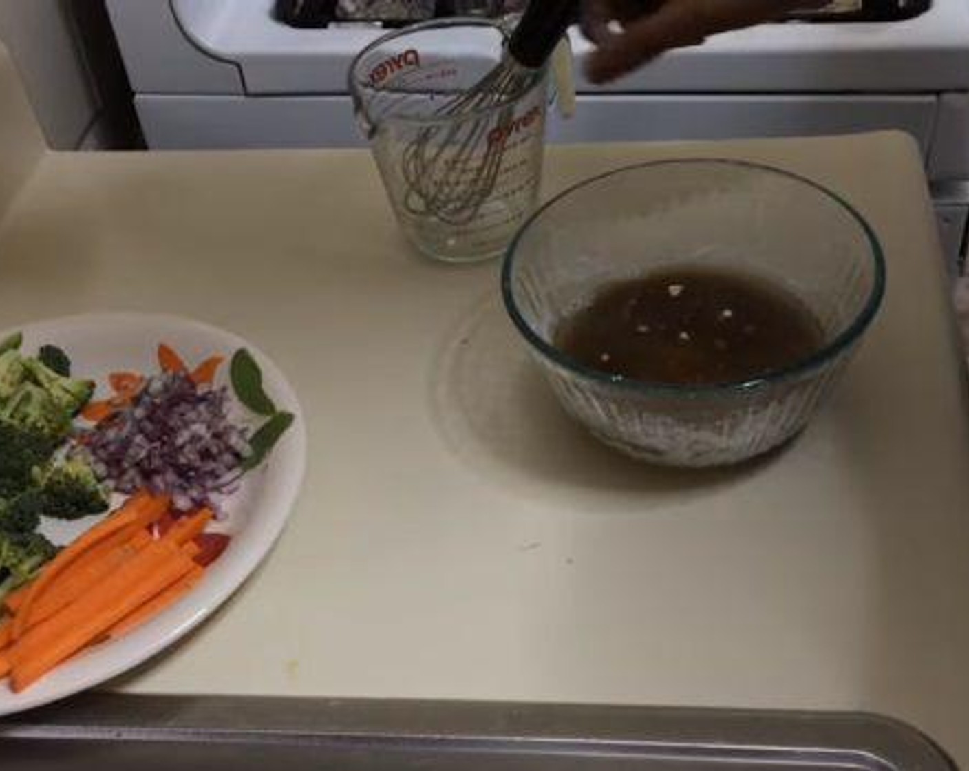 step 2 Then in a separate bowl, mix together the Low-Sodium Chicken Broth (1 cup) Honey (1/4 cup), Fresh Ginger (1/4 tsp), Garlic (2 cloves) and Soy Sauce (1/4 cup).
