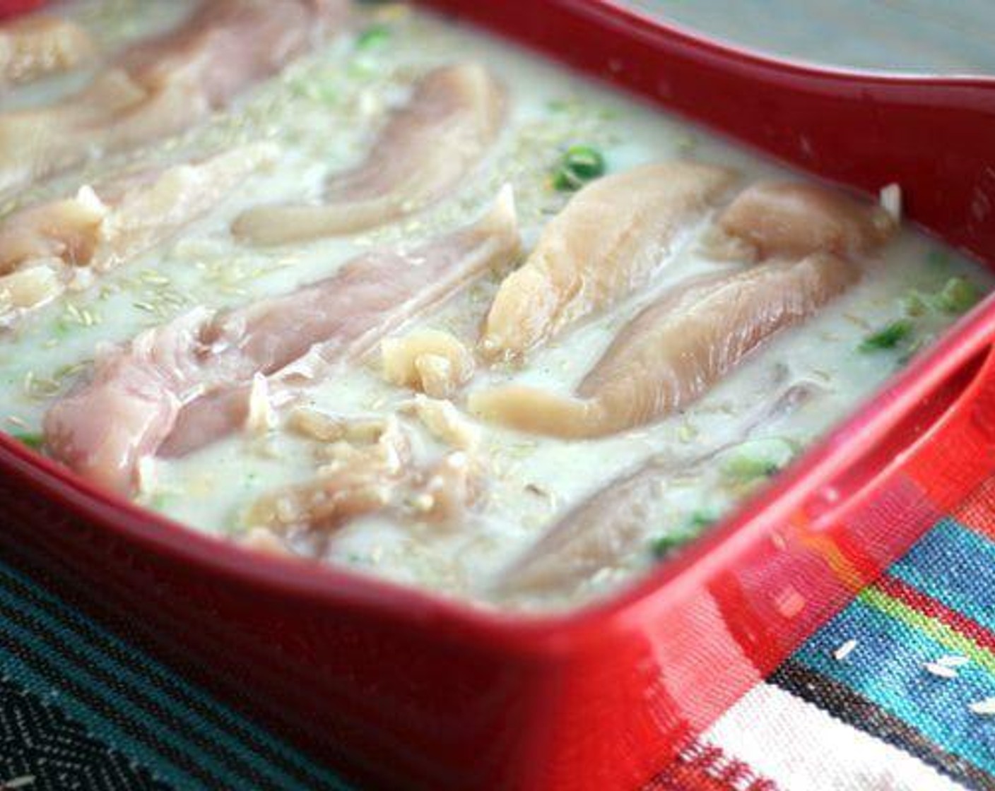 step 5 Place the chicken strips on top of the broccoli and cheddar mixture. Cover the dish with foil and bake for 45 minutes to 1 hour, until the chicken is no longer pink in the center and the rice is tender.