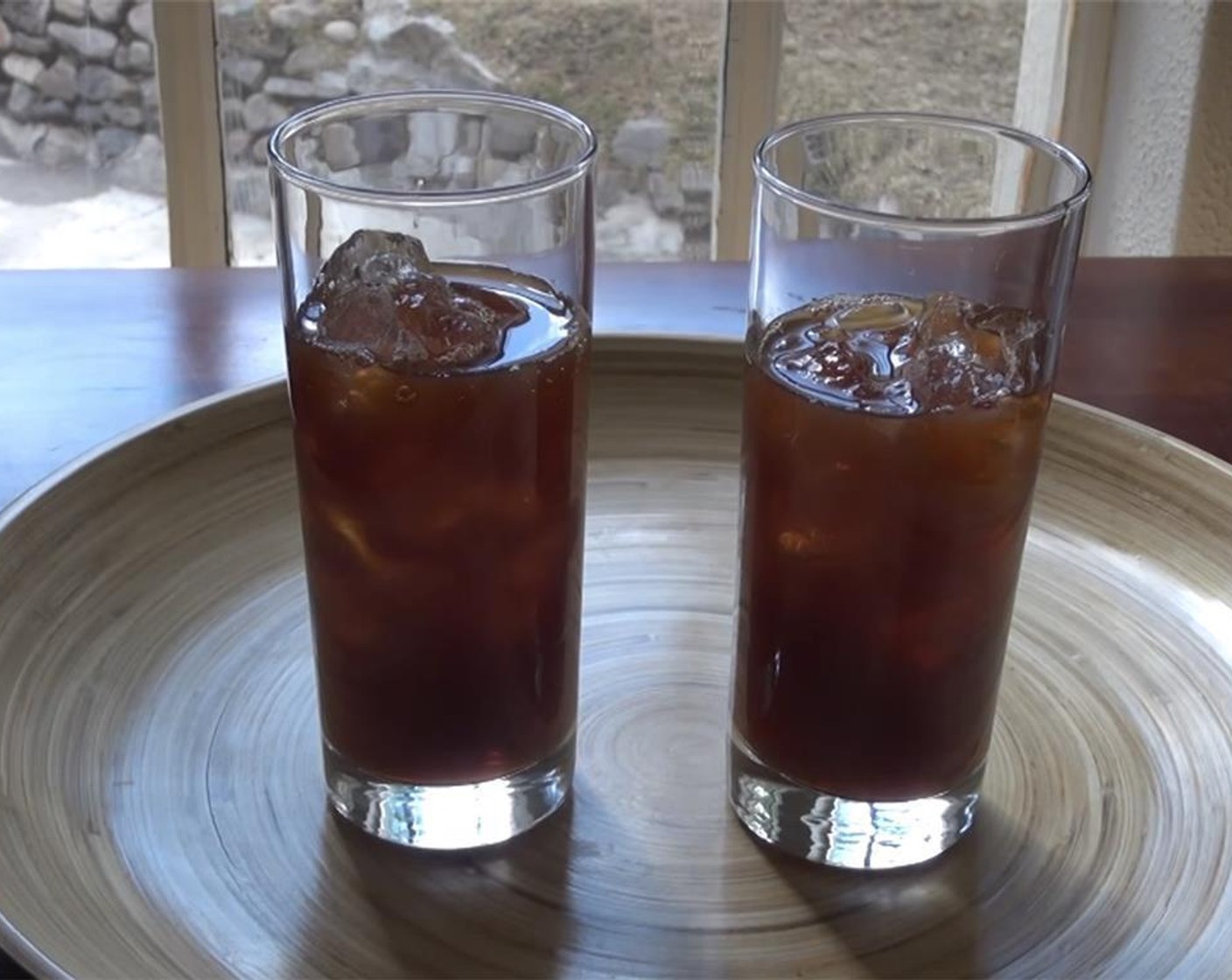 step 3 Fill tall glasses with Ice (to taste) and ¾ of the way with tea.