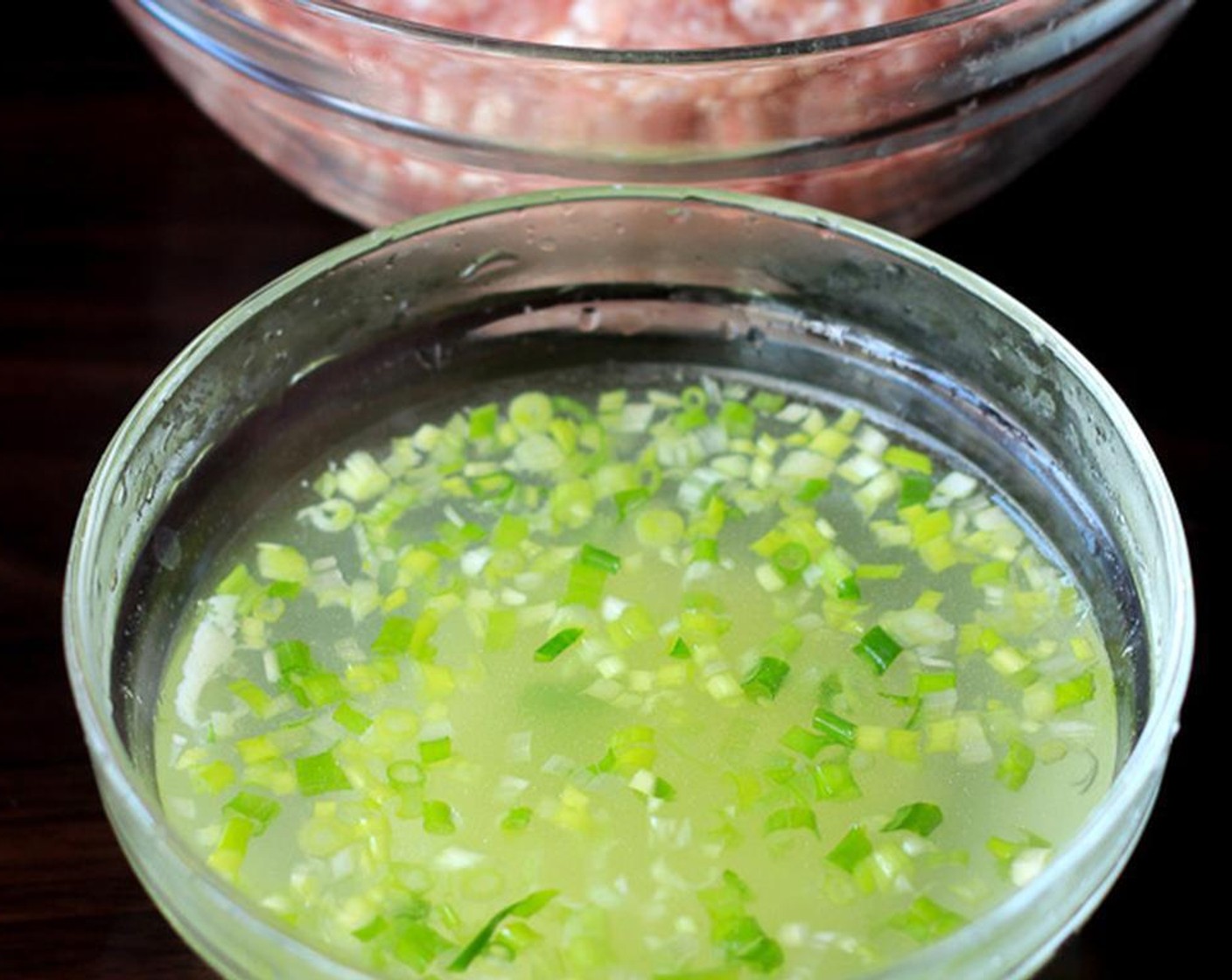 step 4 In a small bowl, soak Fresh Ginger (1 Tbsp) and Scallion (1 Tbsp) with 1/2 cup of hot water for around 10 minutes.