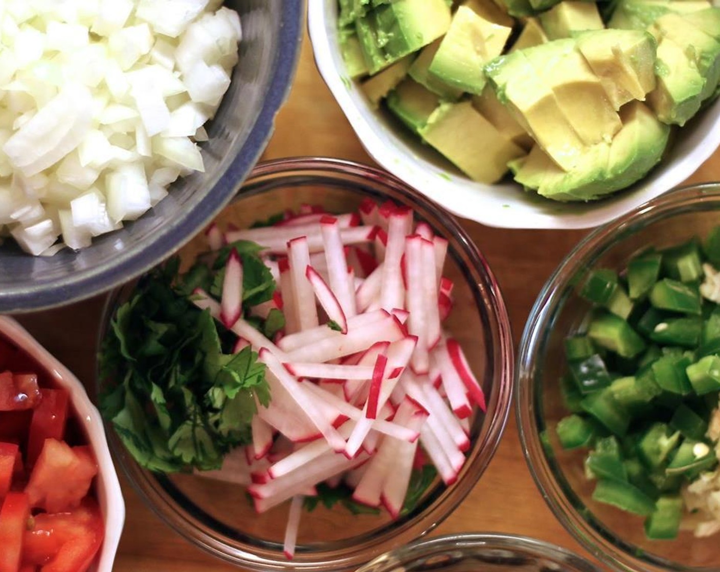 step 4 Dice the Avocado (1), chop the Fresh Cilantro (1 handful), and julienne the Radish (1 bunch).