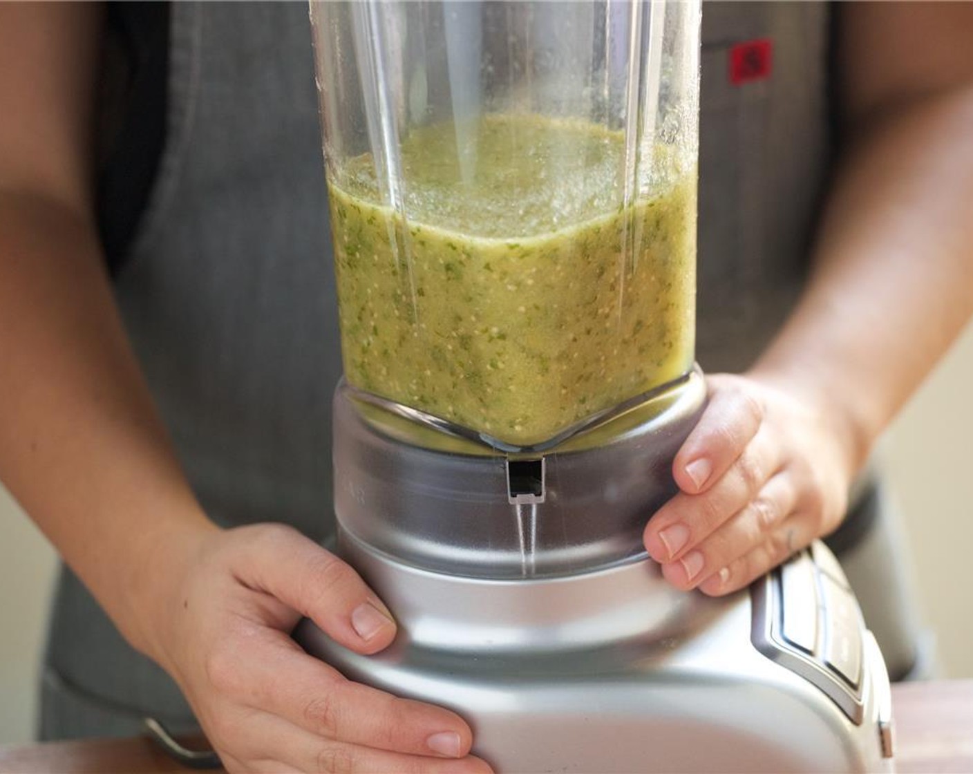 step 13 Add the cilantro leaves and pulse carefully until smooth, then set aside.