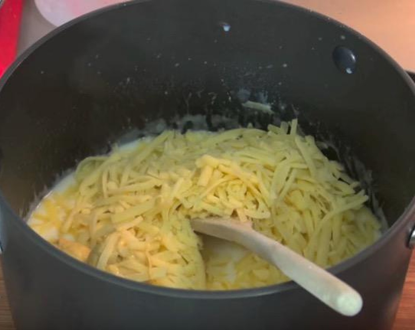 step 4 Add Cheddar Cheese (2 cups), Dijon Mustard (1/2 Tbsp) and Cayenne Pepper (1 pinch). Stir together until smooth.