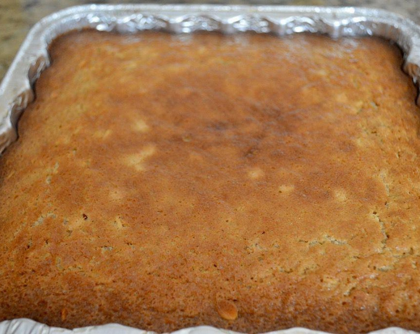 step 8 Pour the batter evenly into the baking dish and bake it for 55-60 minutes, until golden brown on top and a toothpick comes out cleanly.
