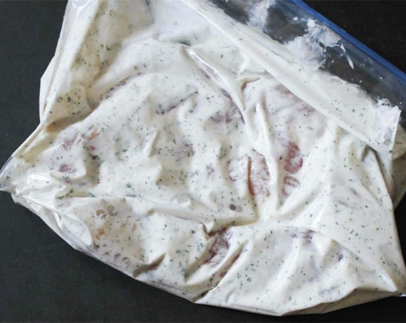 step 2 Place Chicken Tenders (1 lb) in a large Ziploc bag. Add 3/4 cup of the ranch and seal the bag, removing as much air as possible. Squish the chicken and dressing around, making sure that each tender is well coated. Refrigerate for 30 minutes.