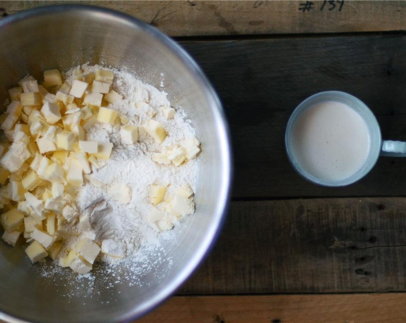 step 2 Add the Unsalted Butter (1 cup) and begin to work butter into flour mixture using your fingertips or a pastry blender.