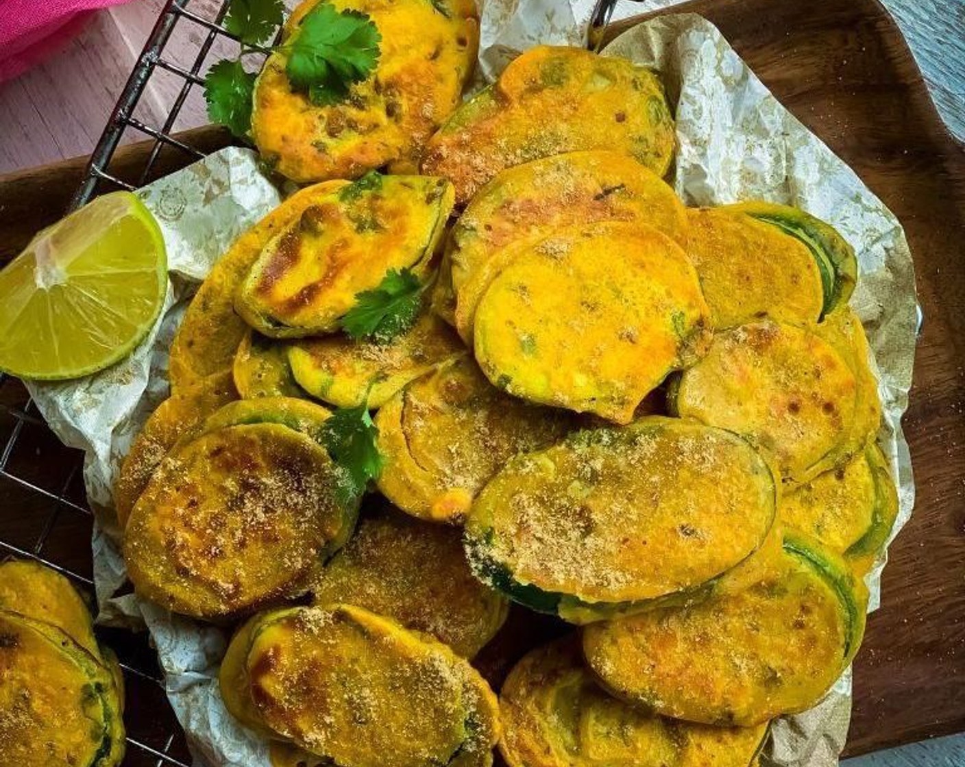 step 10 Transfer the pan-fried fritters to a mesh surface - keeping them from creating excess steam prevents them from getting soggy. Serve with your choice of dip.