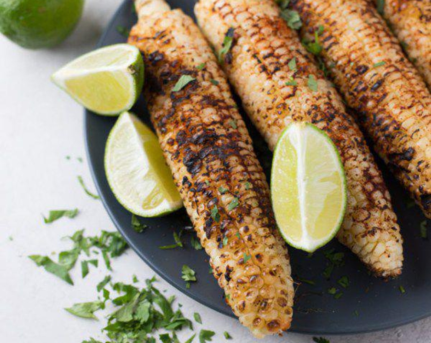 step 5 Remove corn and sprinkle with the Fresh Cilantro (1 Tbsp) and some of the leftover seasoning mix. Serve with Lime (1) and enjoy!