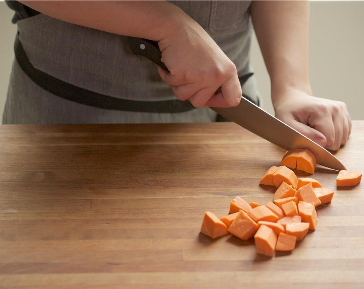 step 2 Peel the Carrot (1) and cut into one inch pieces, then place into a large bowl.