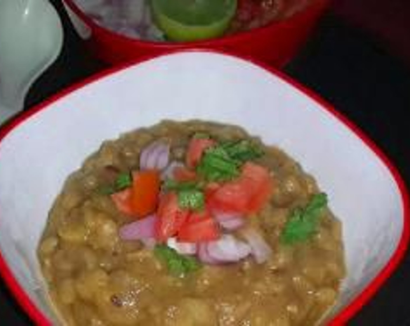 step 8 Transfer in bowls top with Onion (1), Tomato (1), Fresh Cilantro (to taste) and Green Chili Pepper (1). Squeeze some Lemon (1) on top and mix lightly. Serve with kulchas or naans.