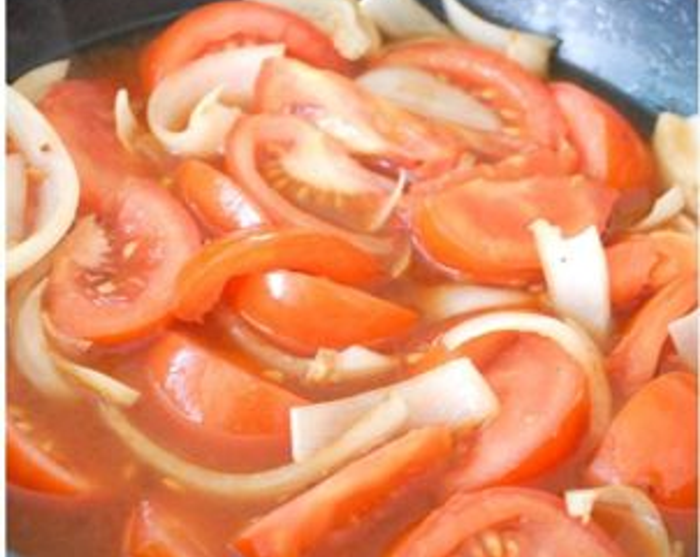 step 3 Add little bit more oil, cook the Onion (1). Then add Tomatoes (3) and some water, bring it to boil, season with salt, sugar, and Tomato Paste (2 Tbsp).