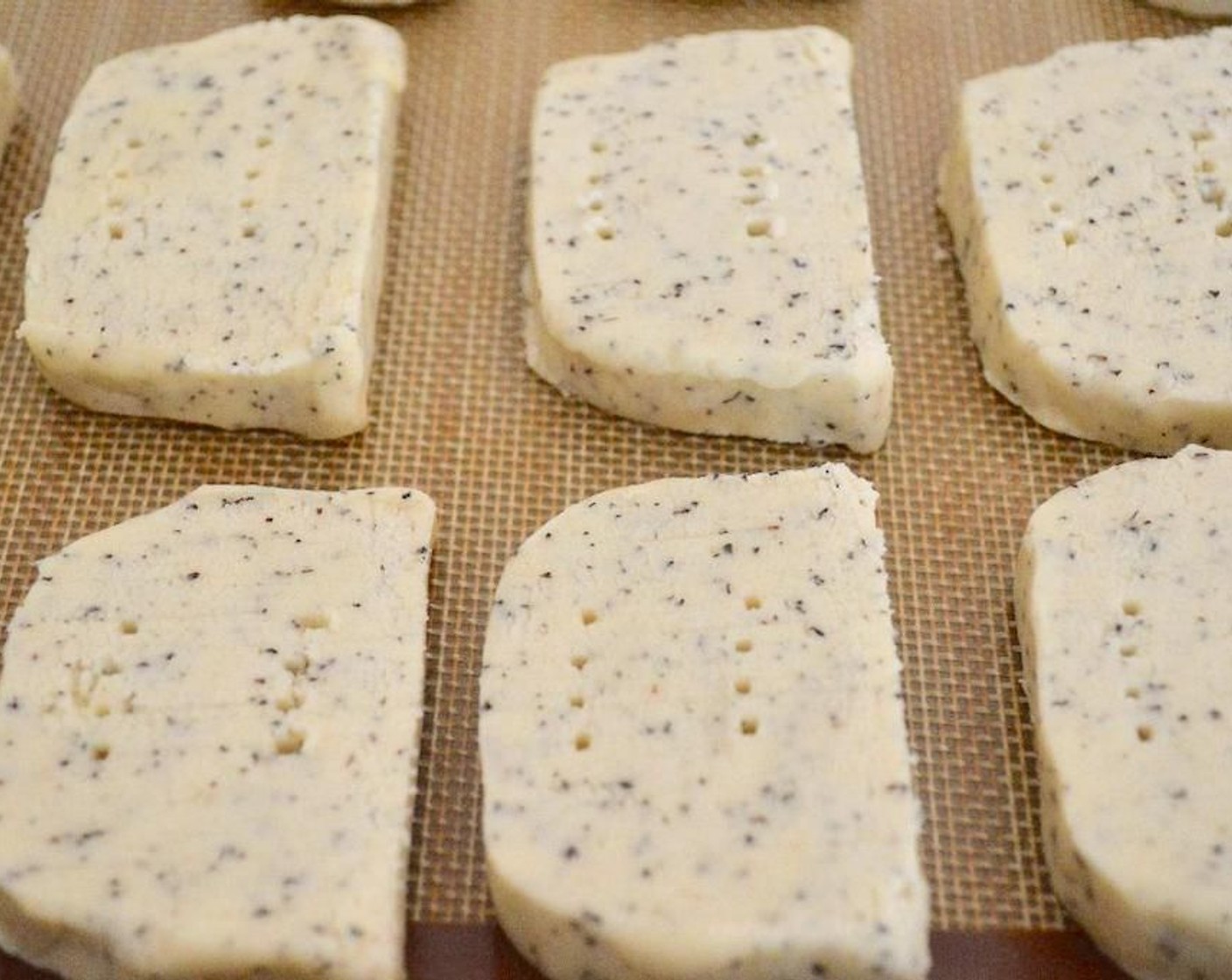 step 5 Take the dough and slice the rectangle into 1/2 inch cookes. You should get roughly 18-20 out of the rectangle. Line them up with a little room in between them on the sheet tray and bake them for 20 minutes.