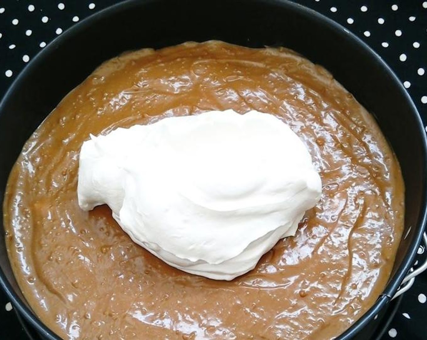 step 6 Place the Whipping Cream (1 cup) in a bowl and add the Caster Sugar (1/2 cup) and Vanilla Essence (1 tsp). Beat until it forms stiff peaks. Pour this whipped cream on top of the toffee layer. Spread well and put in the fridge to chill until ready to serve.