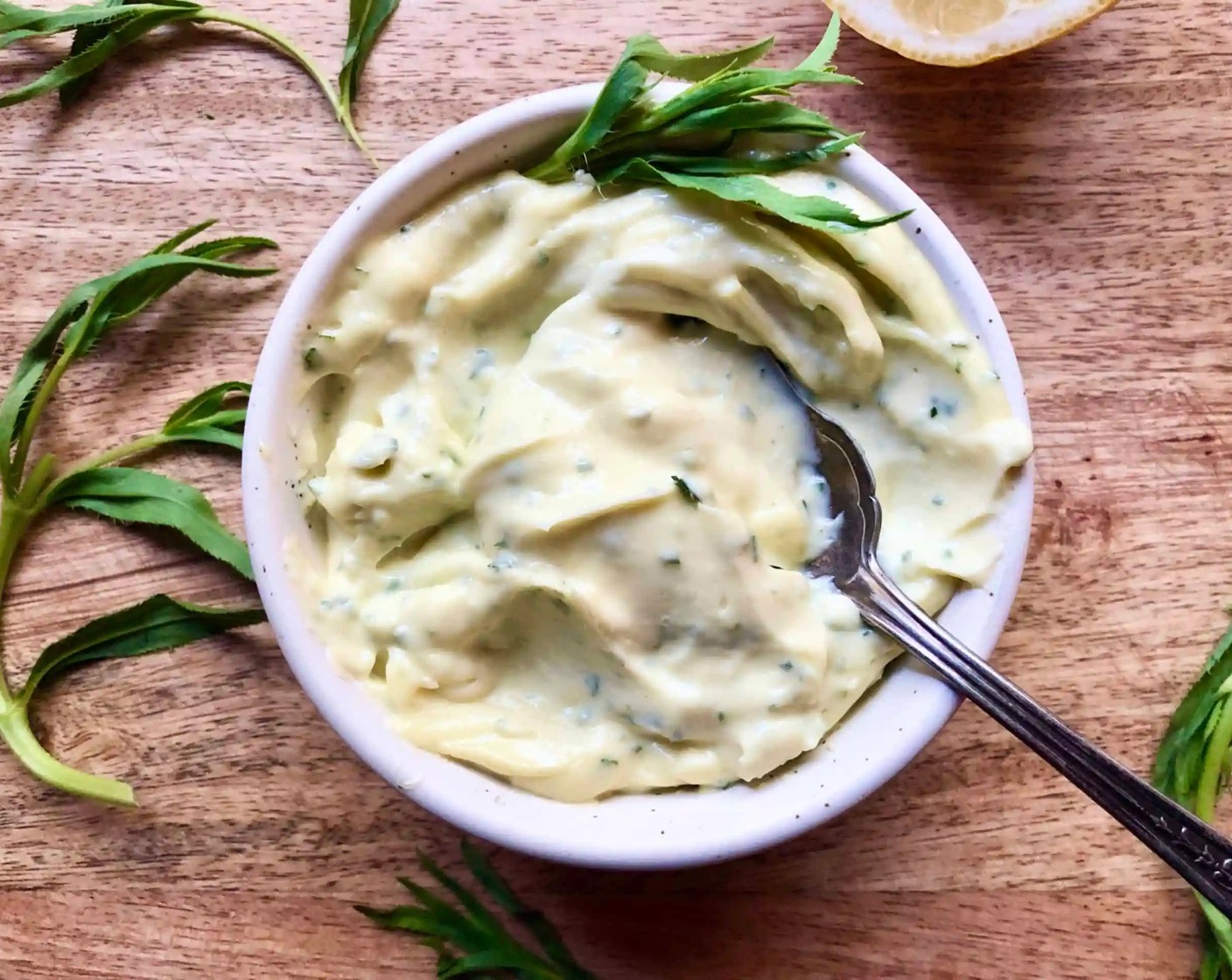 step 5 With the processor running, slowly drizzle in the Extra-Virgin Olive Oil (2 Tbsp). Scrape down the sides of the bowl again and, if desired, season with up to 1 tsp of additional lemon juice. Cover and set aside.