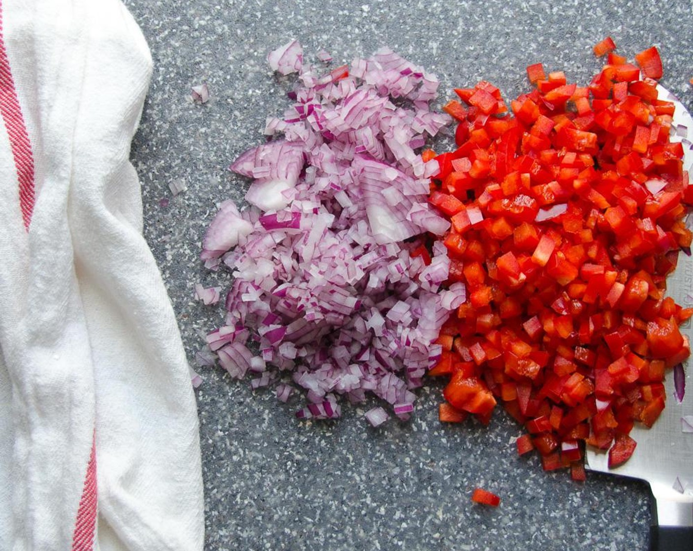 step 4 Prepare the finely diced Red Onion (1/2 cup) and dice the Red Bell Pepper (1). Add them to a large mixing bowl.