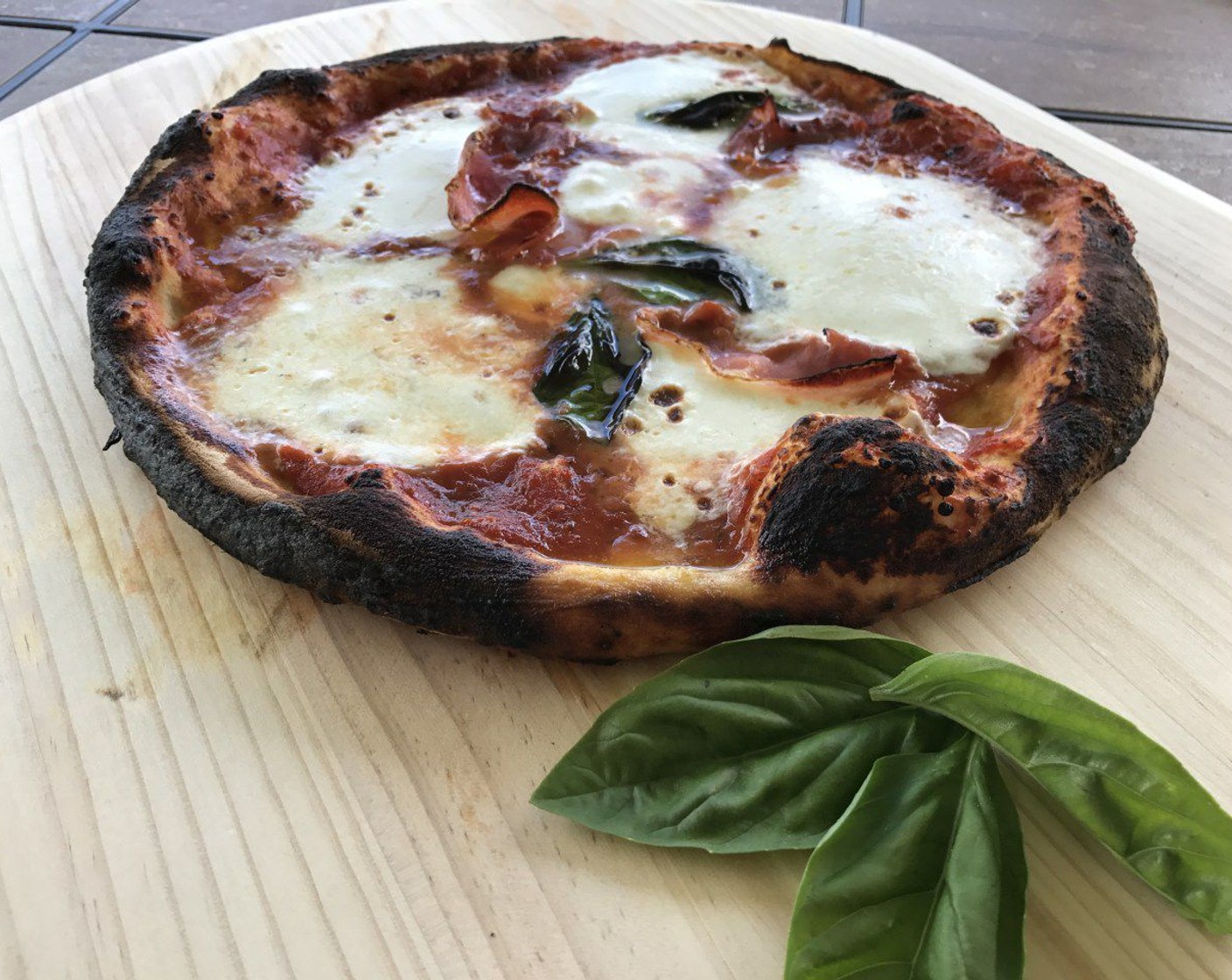 step 8 Bake on brick stone until cheese is melted and crust is at least brown, 3-15 minutes depending on the type of oven used. If using a pizza oven, you can let the crust get a little burnt for a more rustic finish.