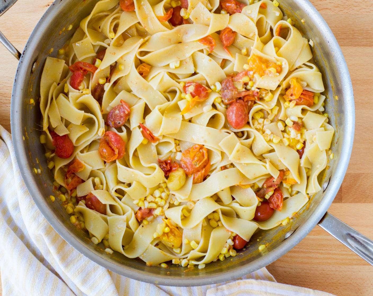 step 5 Add the drained pasta and Grated Parmesan Cheese (1/2 cup) to the skillet with the tomato mixture and toss to combine. If the sauce is too thick, add some of the reserved pasta cooking water to thin it out.