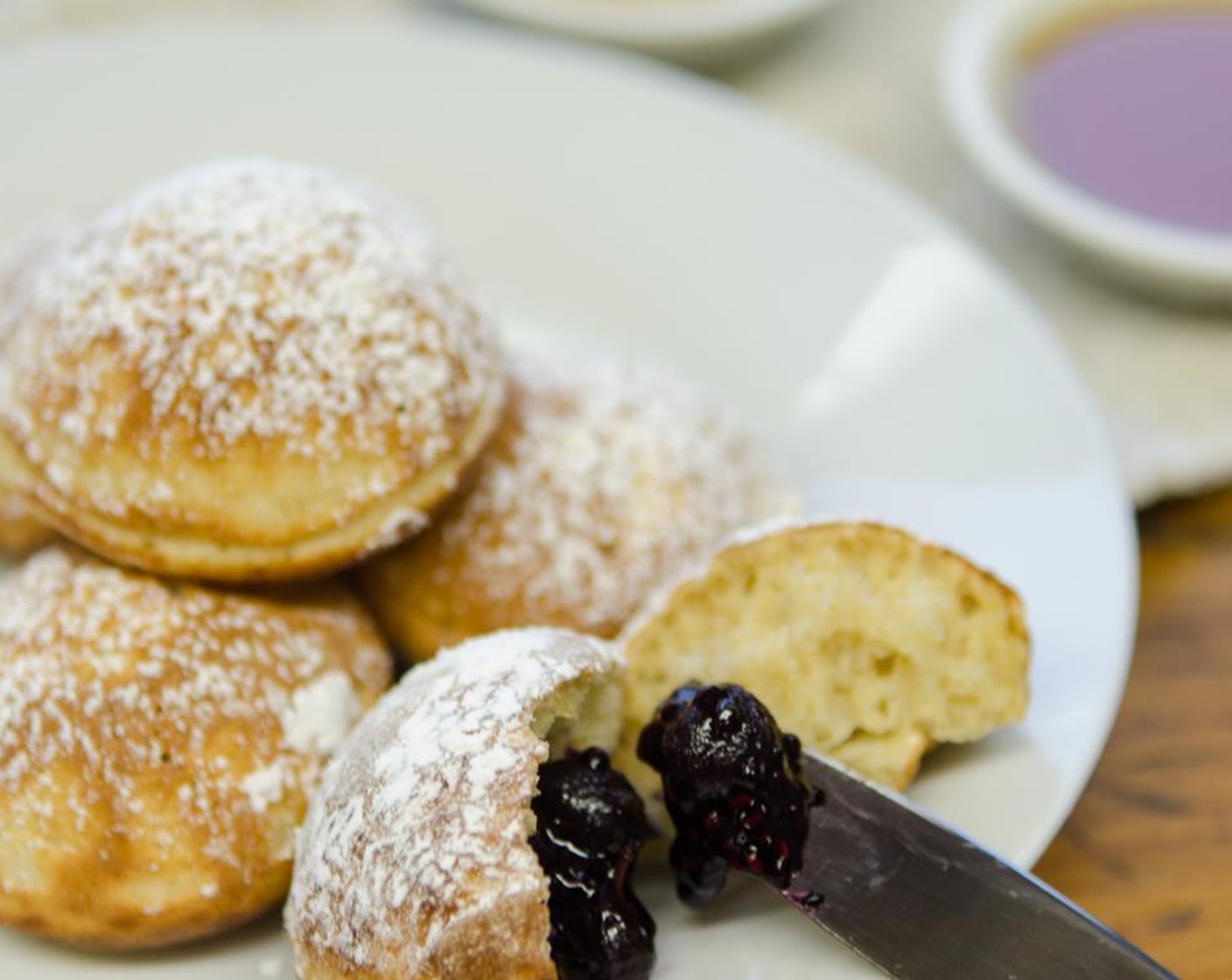 step 15 Remove from aebleskiver pan and dust with Powdered Confectioners Sugar (to taste) to serve. Feel free to add jam in the middle when eating!