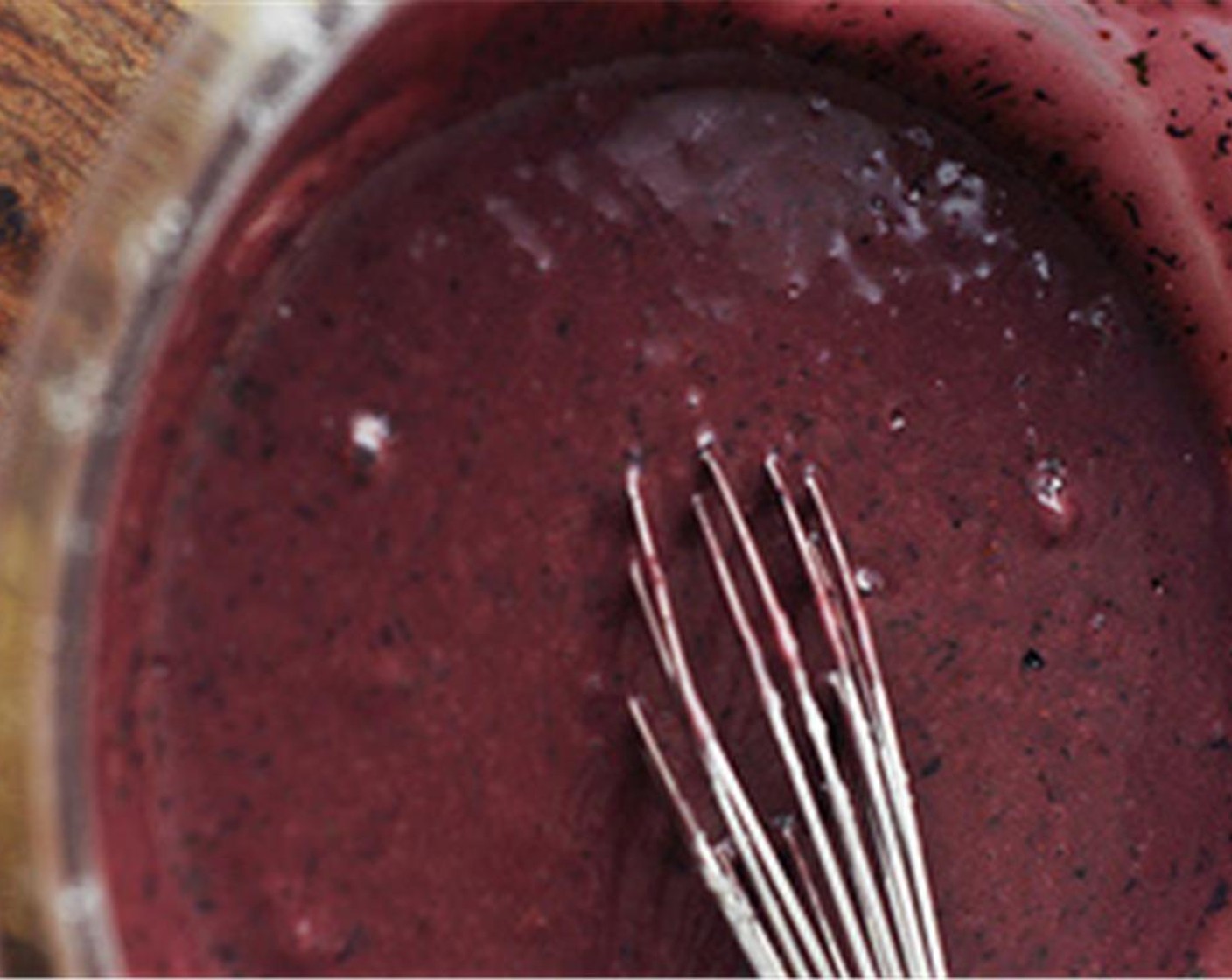 step 13 In a large bowl, combine the Powdered Confectioners Sugar (3 cups) and blueberry mixture (a spoonful at a time) until the glaze is smooth and the perfect dipping consistency. Whisk until desired consistency is reached.