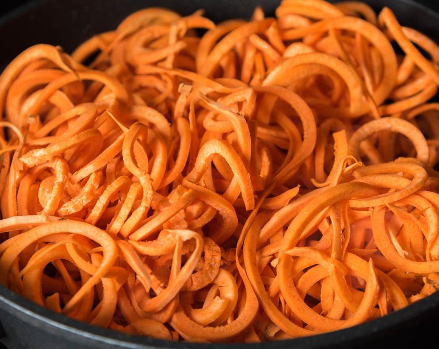 step 5 Cook potato noodles: Cut Sweet Potatoes (3) into noodles using a spiralizer. If you do not have a spiralizer, use a julienne peeler or mandoline to cut sweet potatoes into strips.