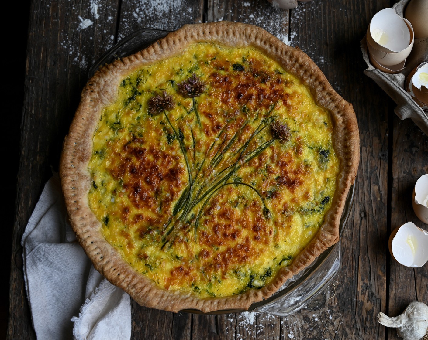 step 10 Envelop the edges of the quiche with foil to prevent further browning and bake for 35-40 minutes or until set in the middle and lightly browned on top.