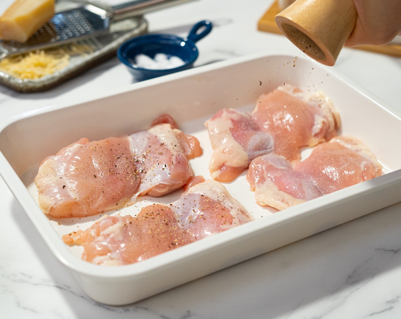 step 1 Season the Boneless, Skinless Chicken Thigh (1 lb) on all sides with Salt (1/2 tsp) and Ground Black Pepper (1/2 tsp).