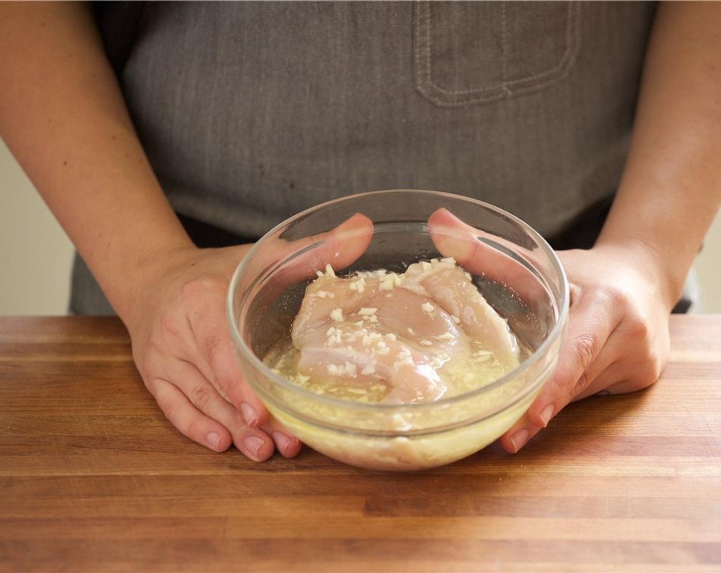 step 12 Add three quarters of the chopped garlic, Extra-Virgin Olive Oil (2 Tbsp), Salt (1 tsp), and three quarters of the lime juice to the bowl. Mix until well coated. Cover and refrigerate for ten minutes.