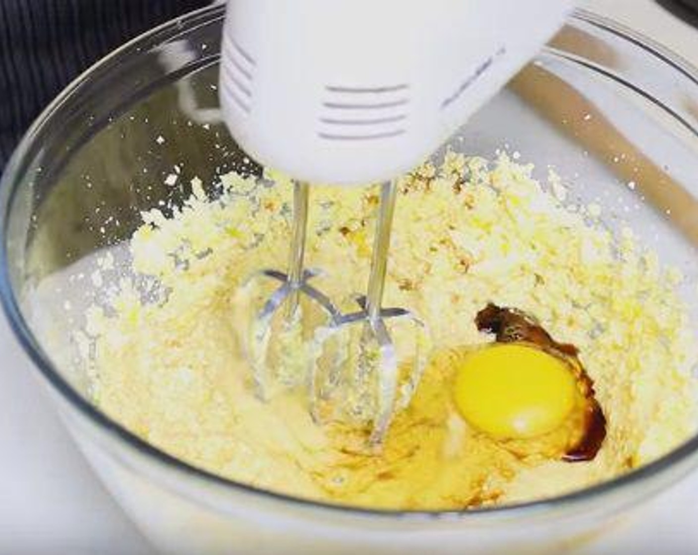 step 4 In a large bowl, cream together Butter (4 Tbsp) and Caster Sugar (1 cup) until fluffy. Add Pure Vanilla Extract (2 tsp), Farmhouse Eggs® Large Brown Eggs (5), 1 at a time and mix.  Then mix in Sour Cream (1/2 cup) and Milk (1/2 cup). Add flour mixture and whisk until there’s no lumps. Add the blueberries and fold them in with a spatula.