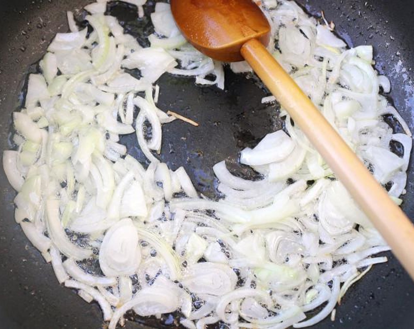 step 4 Saute White Onion (1) in Ghee (2 Tbsp).