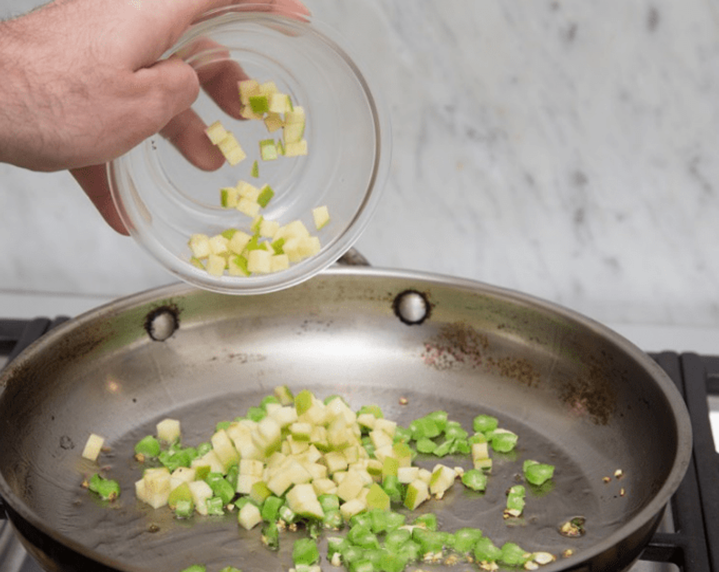 step 10 Add apples, and cook 1-2 minutes more, or until stem pieces are slightly tender.