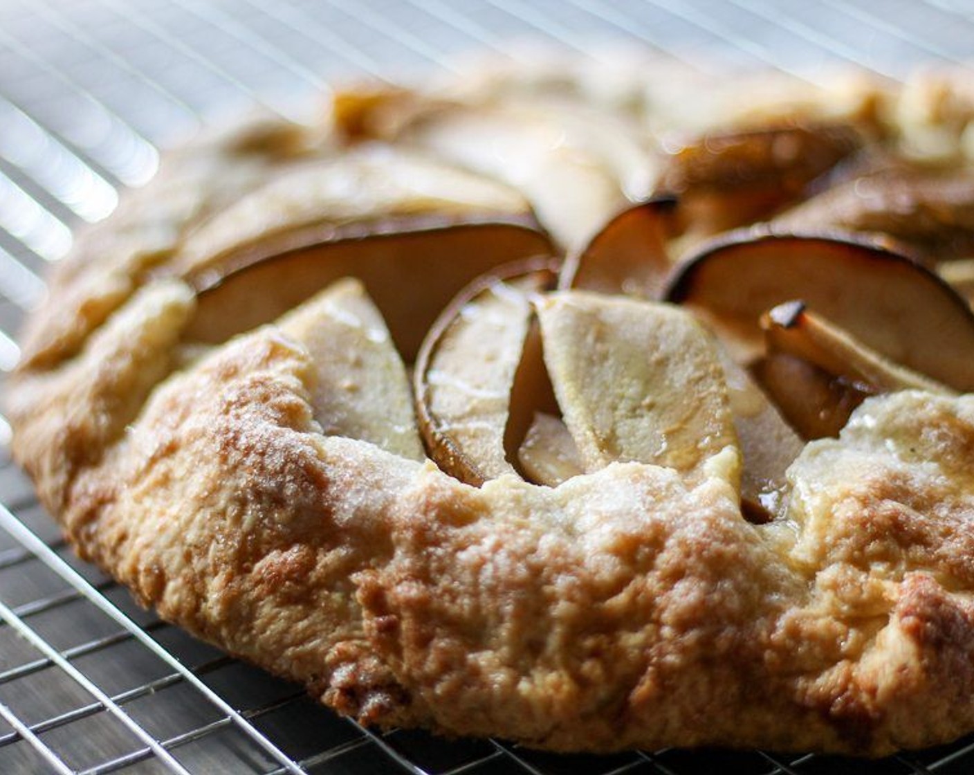 step 12 When the crust is golden brown, remove from the oven. Transfer the galette to a cooling rack. Allow the galette to cool for 20 minutes before slicing and serving. Drizzle with Honey (to taste) before serving.