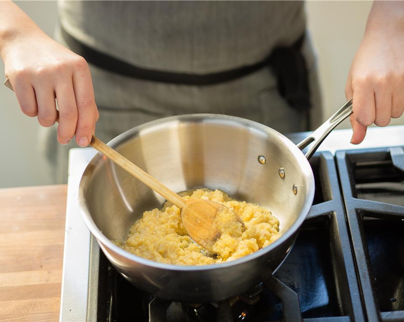 step 3 Add two cups of water and bring to a boil. Add Polenta (1/3 cup), Salt (1/2 tsp) and reduce heat to low and cover. Stir occasionally. Cook for 20 minutes. Add the Parmesan Cheese (1/4 cup) and stir to combine. Keep warm.