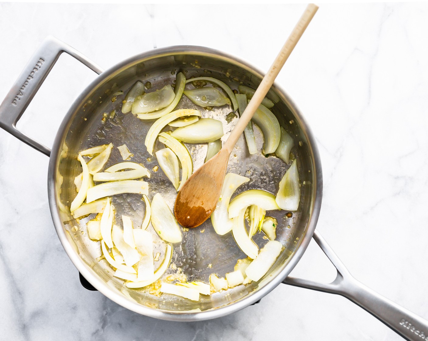 step 4 Add Oil (1 Tbsp) to the saucepan over medium heat. When the oil shimmers or the butter has melted, add Yellow Onion (1) and Garlic (1/2 Tbsp) and sauté for 3 minutes.