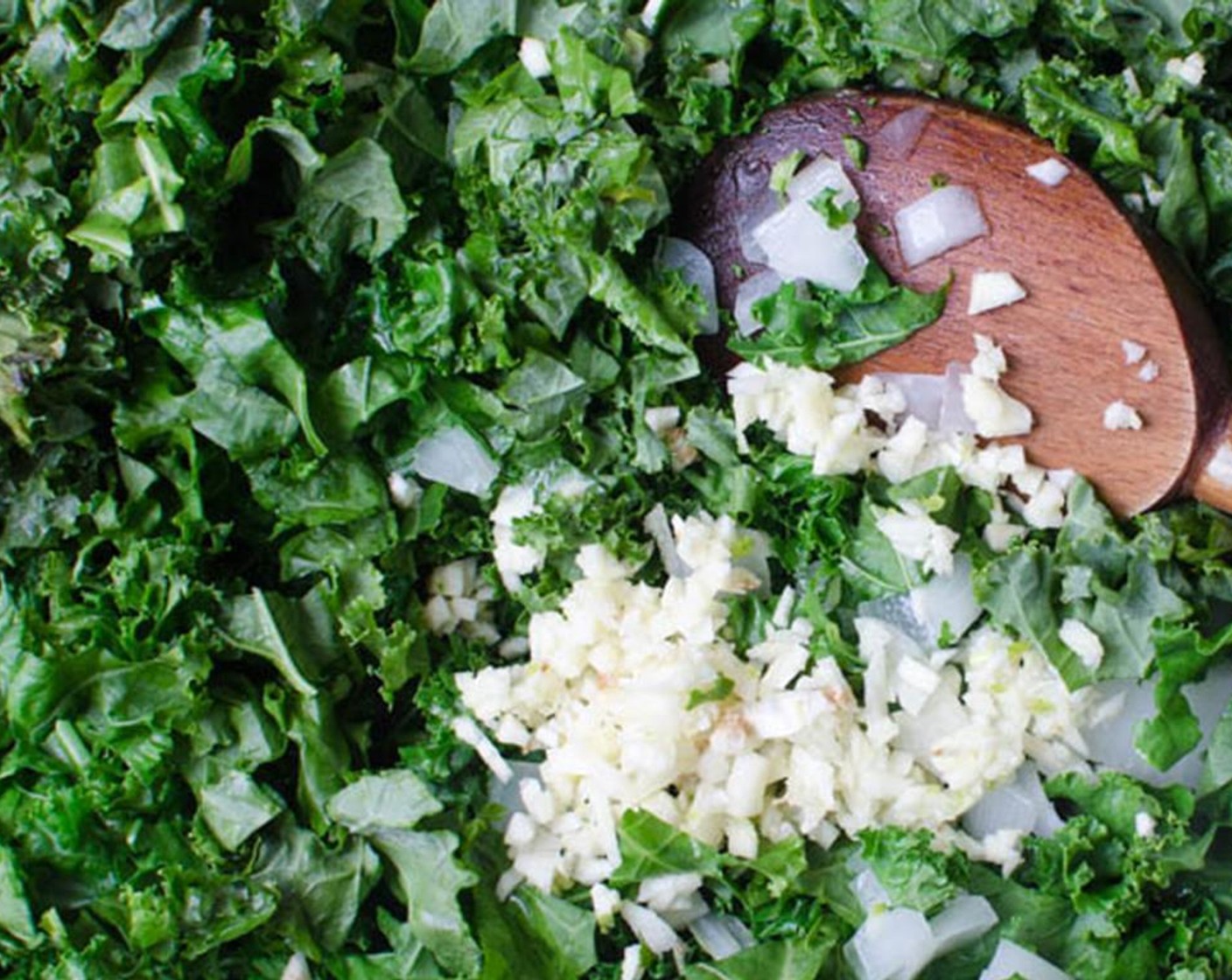 step 5 Chop the kale and add it directly to the pan and cover tightly with a lid. Cook for 2 to 3 minutes, stirring occasionally until the kale has wilted.