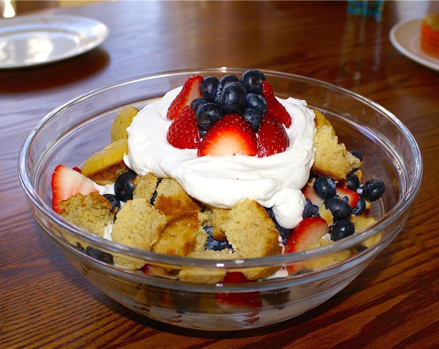 step 8 Top with the rest of the cream and Fresh Mixed Berries (2 cups). Serve and enjoy!