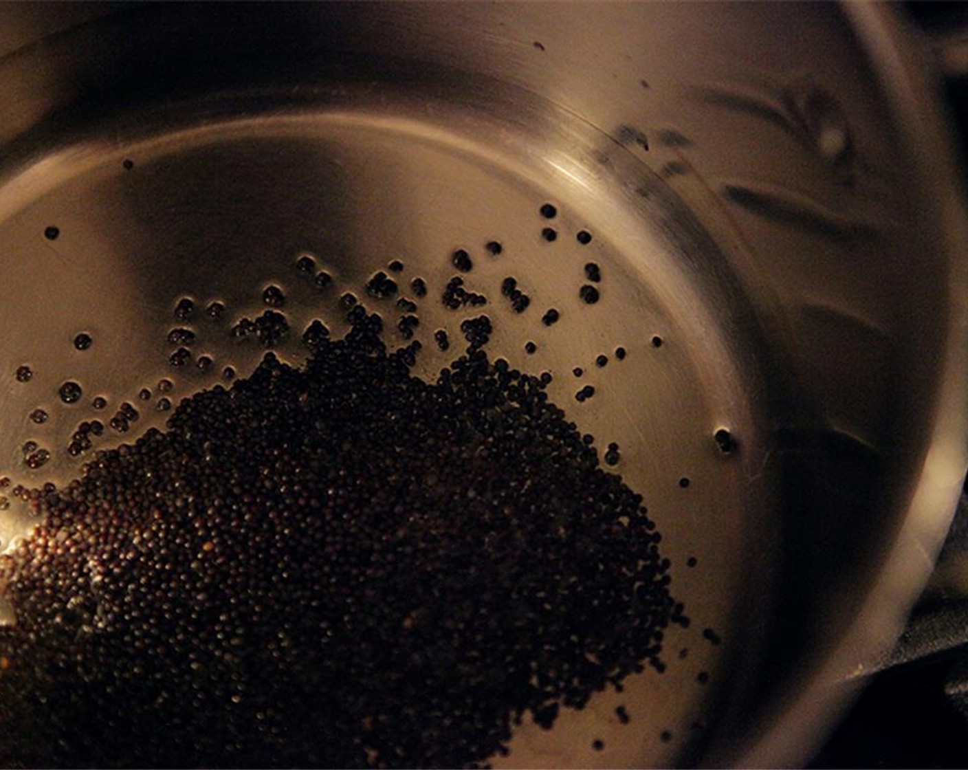 step 2 Heat a small sauce pot over medium heat. Add Olive Oil (1 tsp) and Brown Mustard Seeds (2 tsp). Bloom the seeds in the oil (heat slowly while stirring) until the seeds start to sizzle or pop.