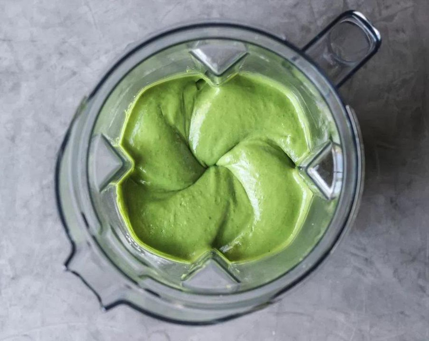 step 6 In the jar of a high-speed blender, add Avocados (3) prepared mint leaves, Maple Syrup (3/4 cup), Coconut Milk (1/4 cup), Matcha Powder (1 Tbsp), Fine Salt (1/4 tsp), Vanilla Extract (1 tsp), juice from Lemon (1), Cacao Butter (1/2 cup) and Mint Extract (4 drops). Blend on low, slowly increasing the speed to medium-low, until the mixture is perfectly smooth. Taste the filling to see if it is minty enough for your liking. Adjust if needed.