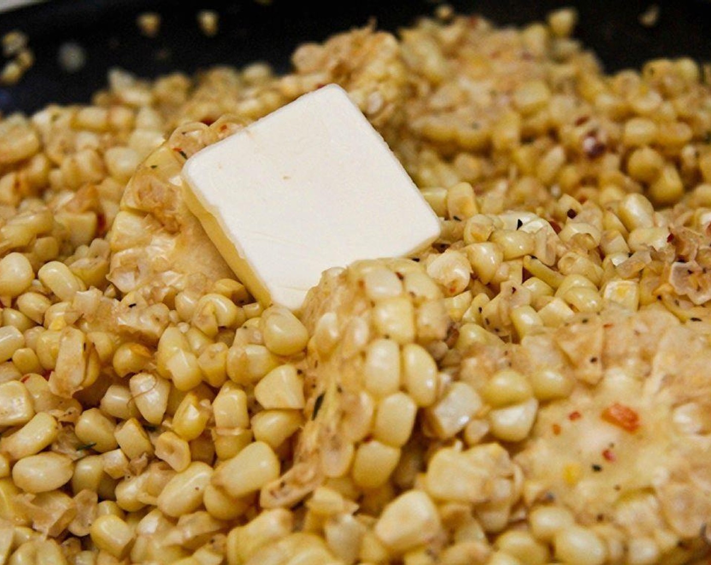 step 11 Cook until the corn is slightly softened, then swirl in the remaining tablespoon of Unsalted Butter (1 Tbsp)