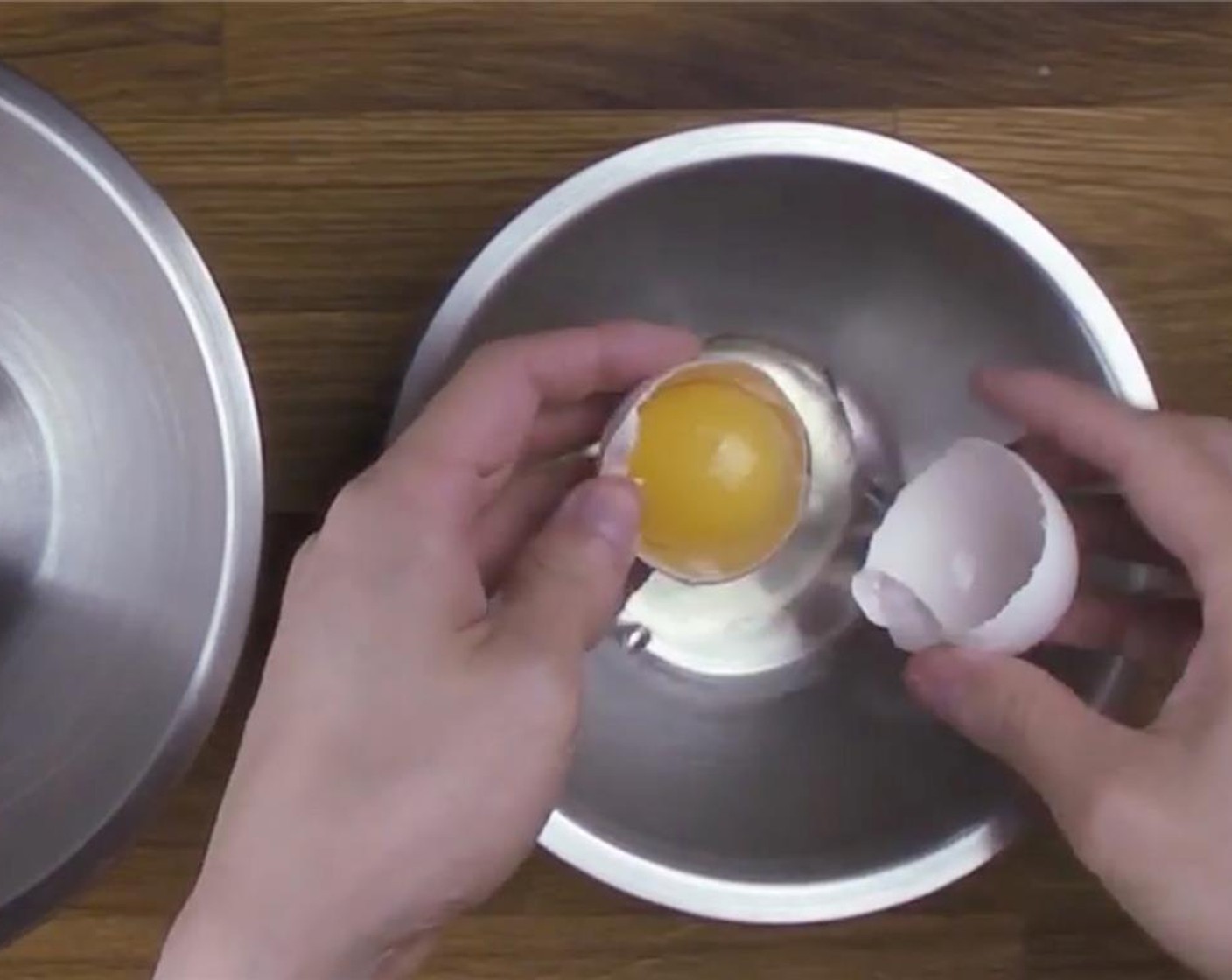 step 3 Crack an extra Farmhouse Eggs® Large Brown Egg (1) and carefully separate the egg whites from the yolk. Pour the egg whites into a small mixing bowl and the egg yolk in a medium mixing bowl.