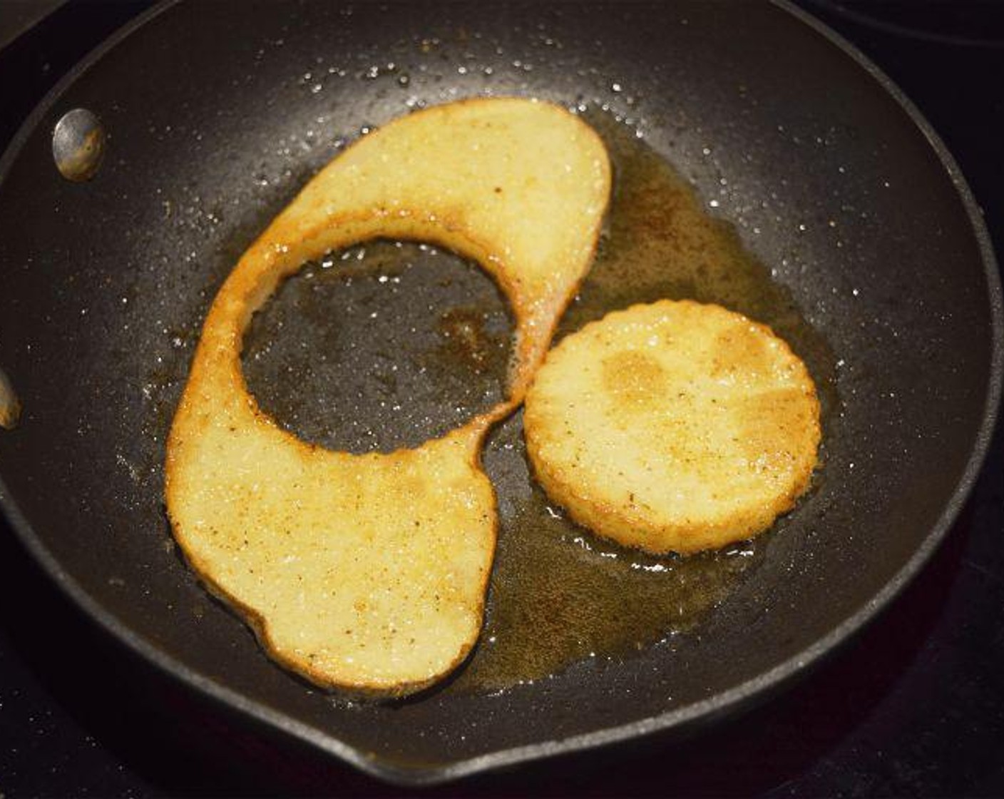 step 2 Add Olive Oil (1/2 tsp) and Butter (1/2 tsp) to a skillet over medium heat. Add the potato (slice and cut-out) and cook for 4 minutes on the first side. Flip and cook for 3 more minutes.