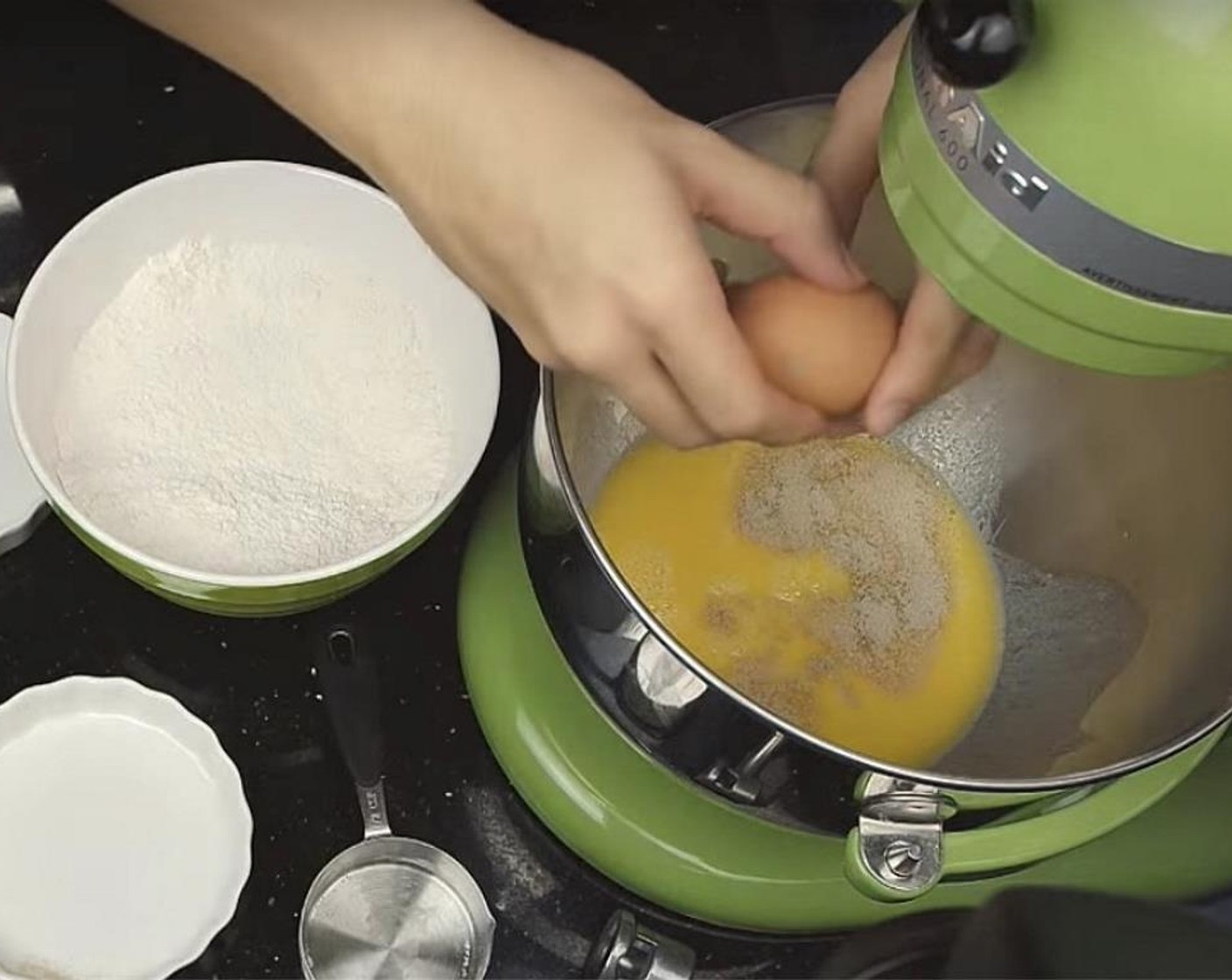 step 1 In a large mixing bowl, first add in Milk (1 cup), Instant Dry Yeast (1 Tbsp), Unsalted Butter (1/3 cup), and Egg (1).