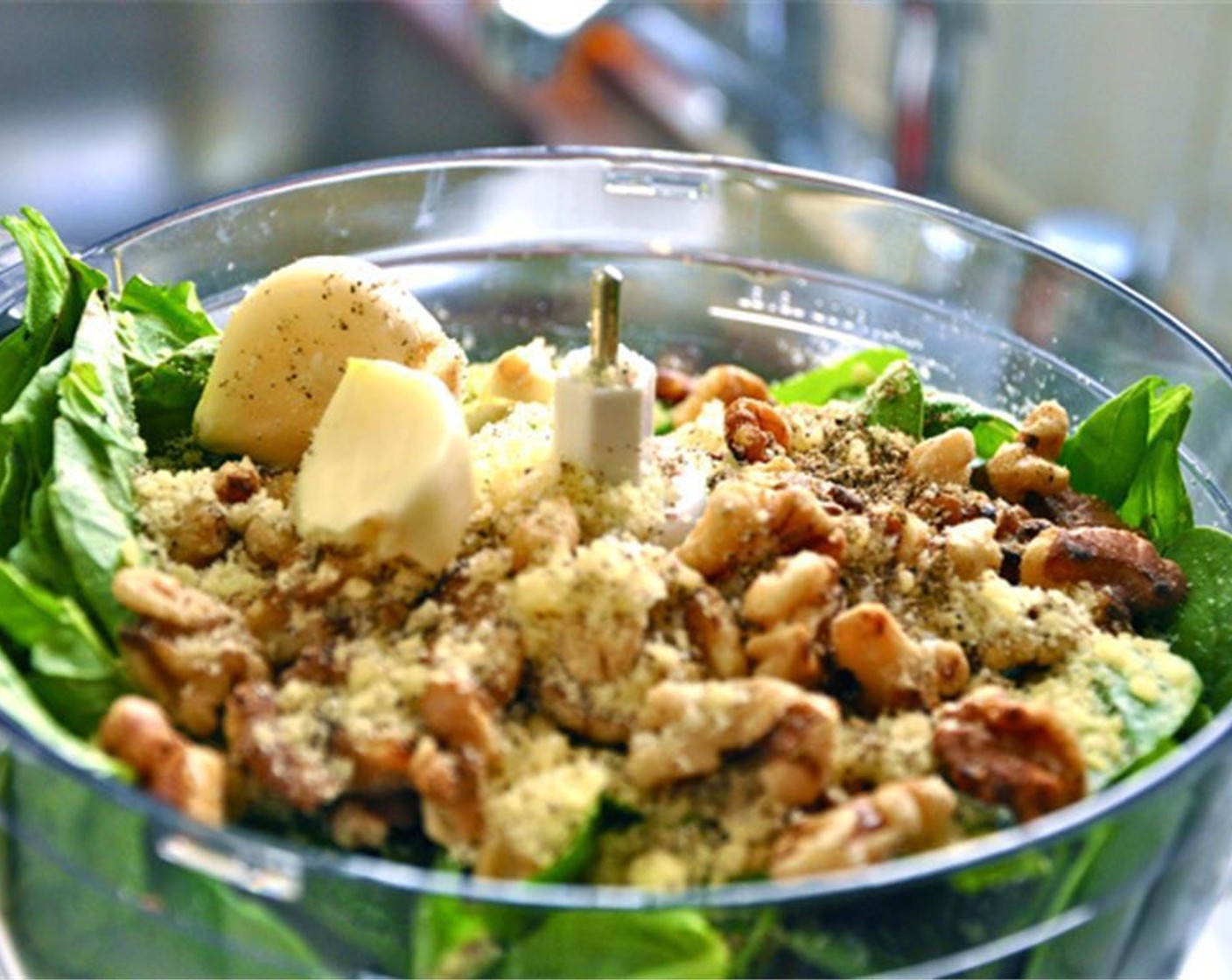 step 3 In a food processor, place the large bag of Fresh Baby Spinach (9 1/2 cups), Fresh Basil (1 bunch), Walnut (1/2 cup), Garlic (2 cloves), Salt (to taste), and Ground Black Pepper (to taste) and Parmesan Cheese (1/4 cup).