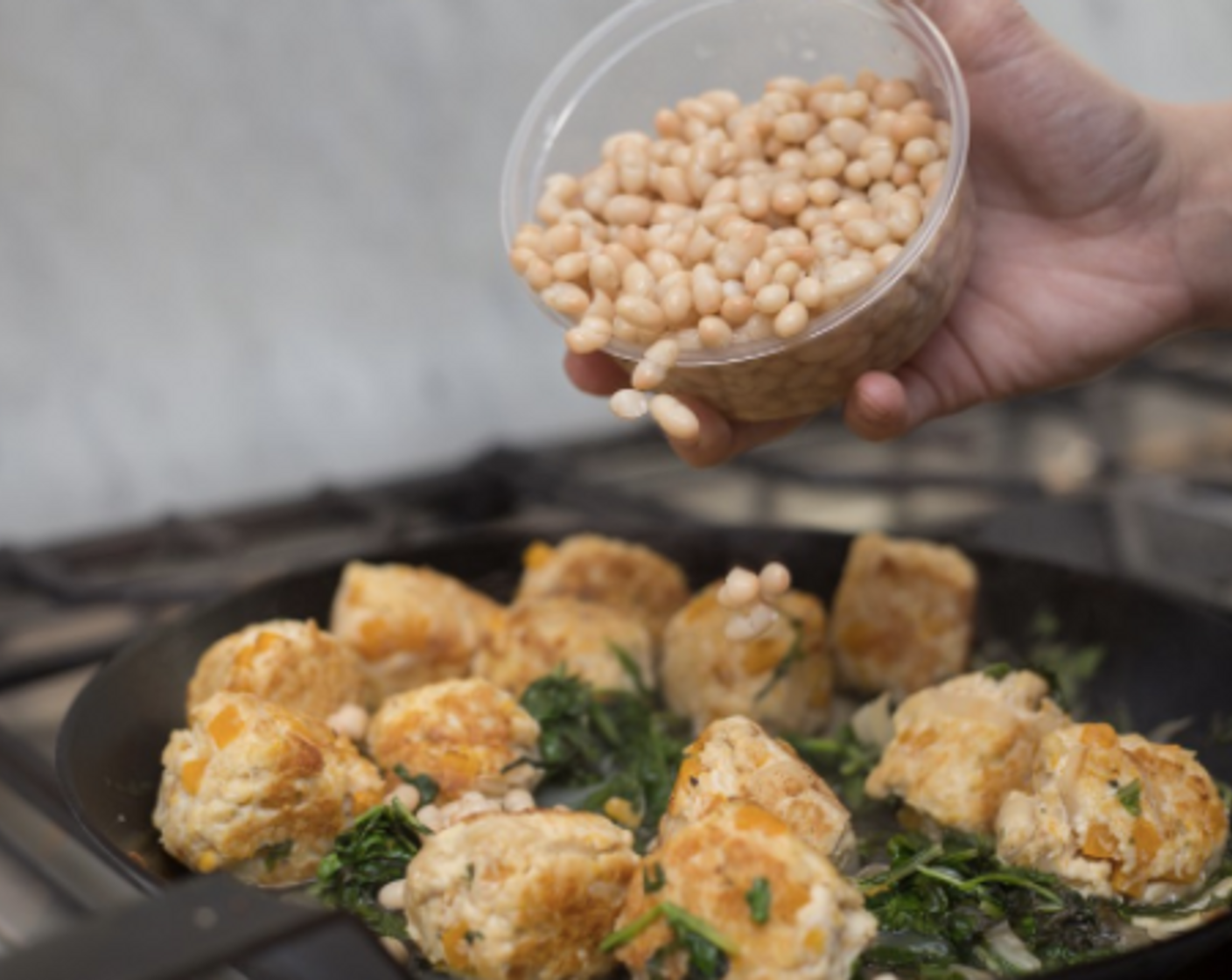 step 13 Stir in white beans, and cook 3 minutes. Melt in a pat of Butter (to taste) and you should have a little bit of rich and brothy pan sauce, add a little more water to the pan if desired.