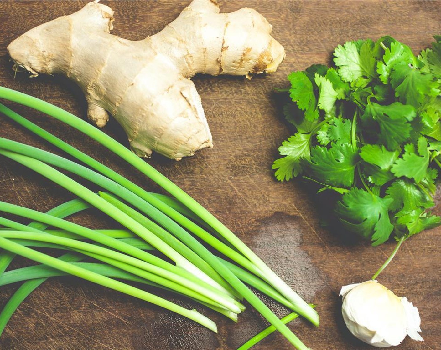 step 1 Trim and thinly slice the Asparagus (1 bunch), cube the Extra Firm Tofu (10 oz). Chop the Fresh Cilantro (1/4 cup). Thinly slice the Scallion (3/4 cup). Mince the Fresh Ginger (2 Tbsp) and Garlic (1 clove).