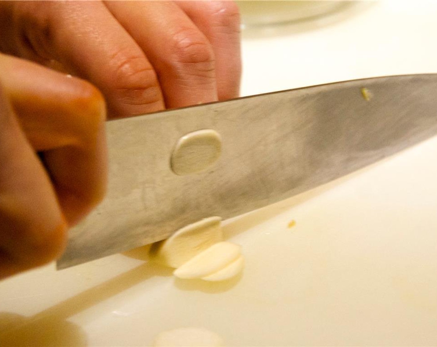 step 3 Thinly slice the Garlic (2 cloves).