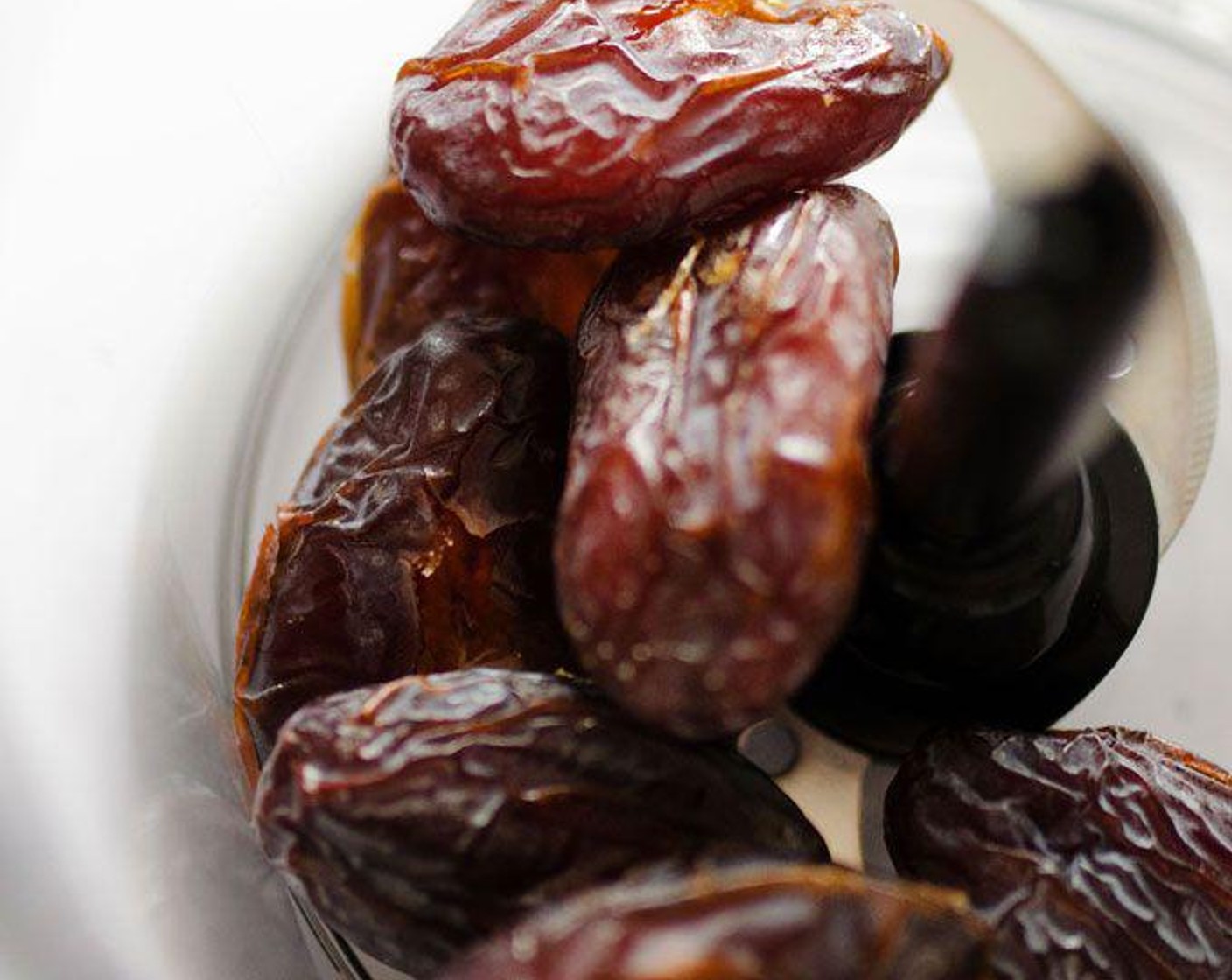 step 1 In a food processor, puree Dates (1/2 cup) into a smooth paste. If your dates are quite hard, soak them in warm water for a bit before pureeing.