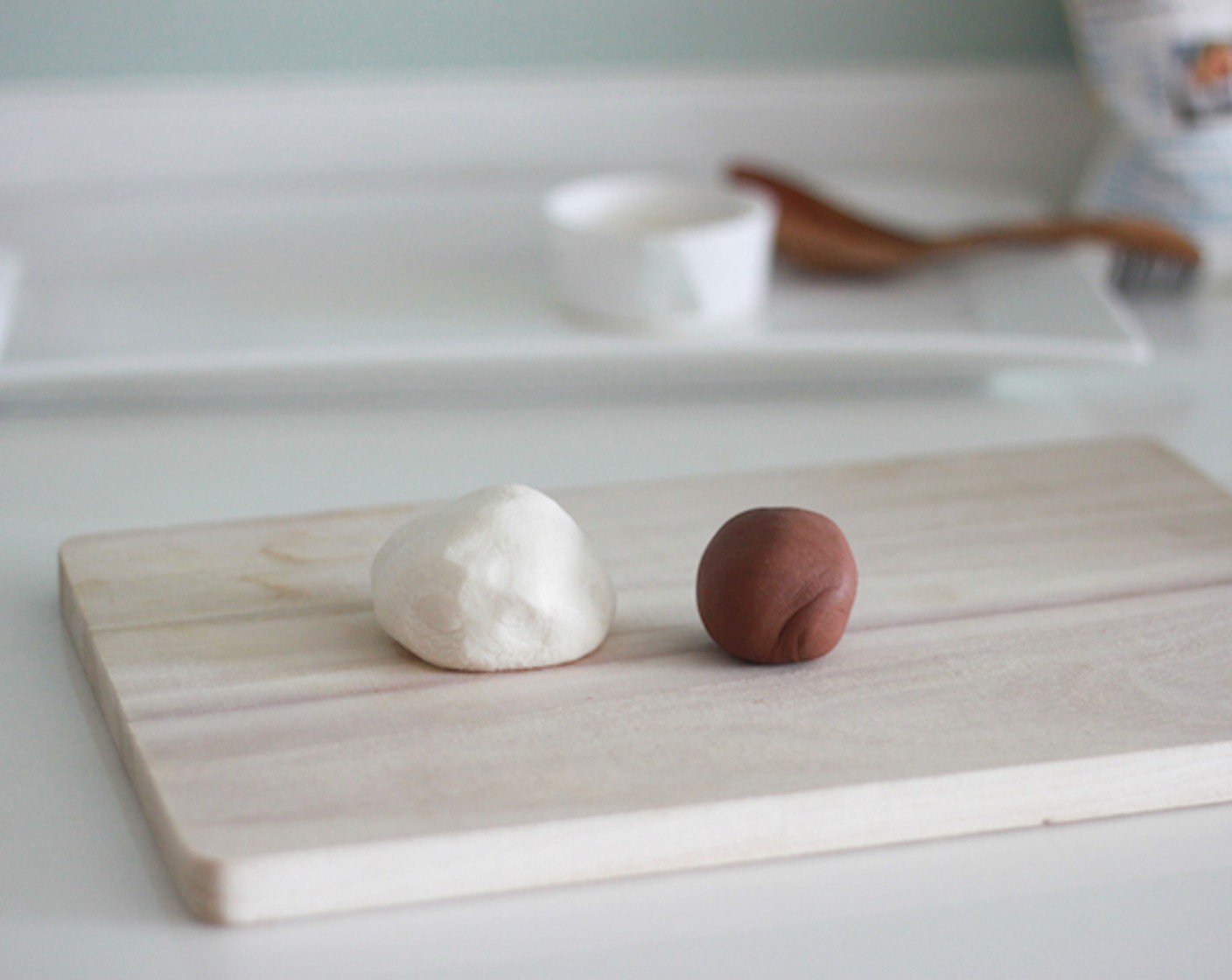 step 7 Separate the dough into 2 colors. Take 1/4 of the dough and knead again with Unsweetened Cocoa Powder (2 Tbsp). The color of brown turns darker after boiling, so no need to put too much cocoa powder this time.